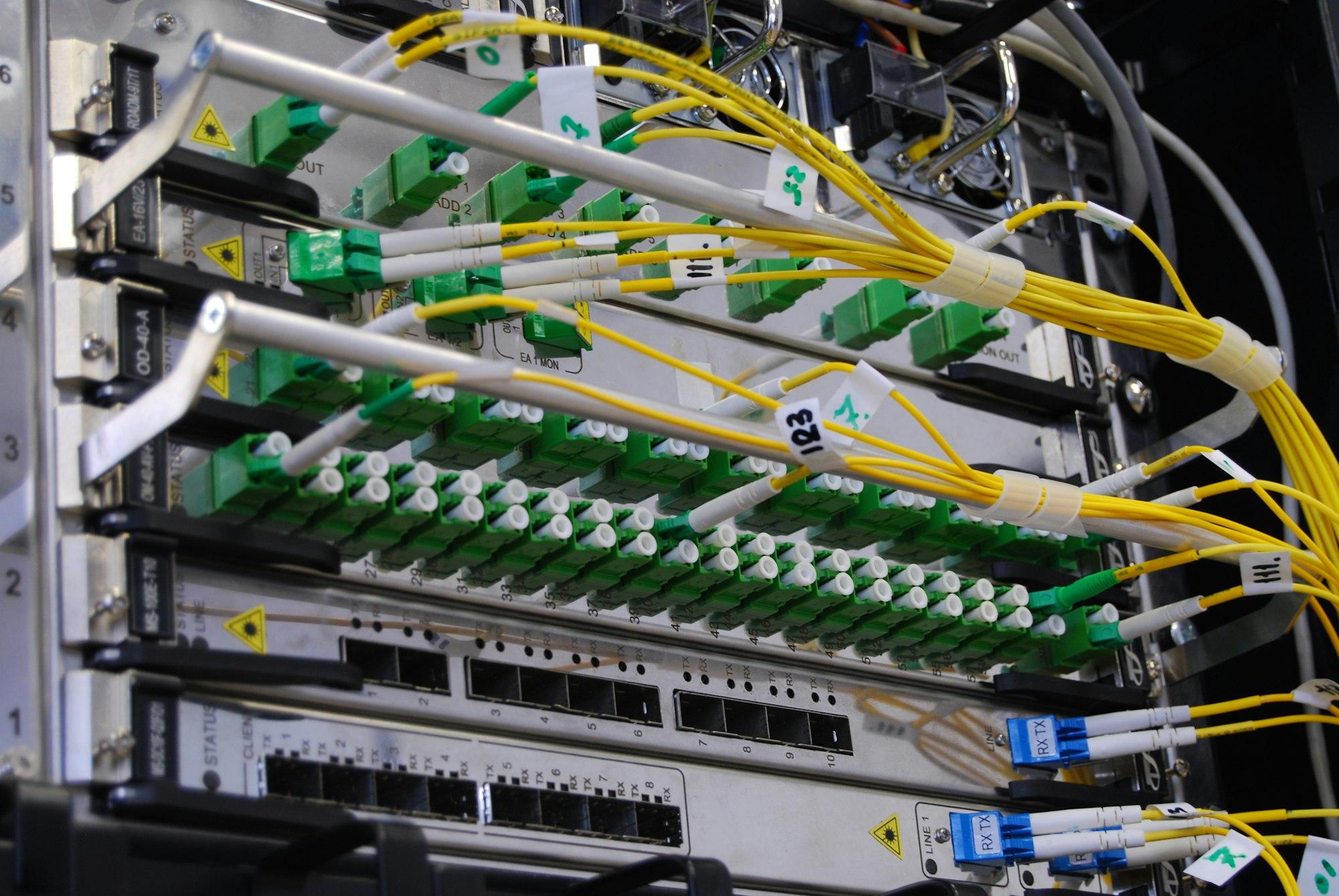Organized fiber optic patch panel and structured cabling