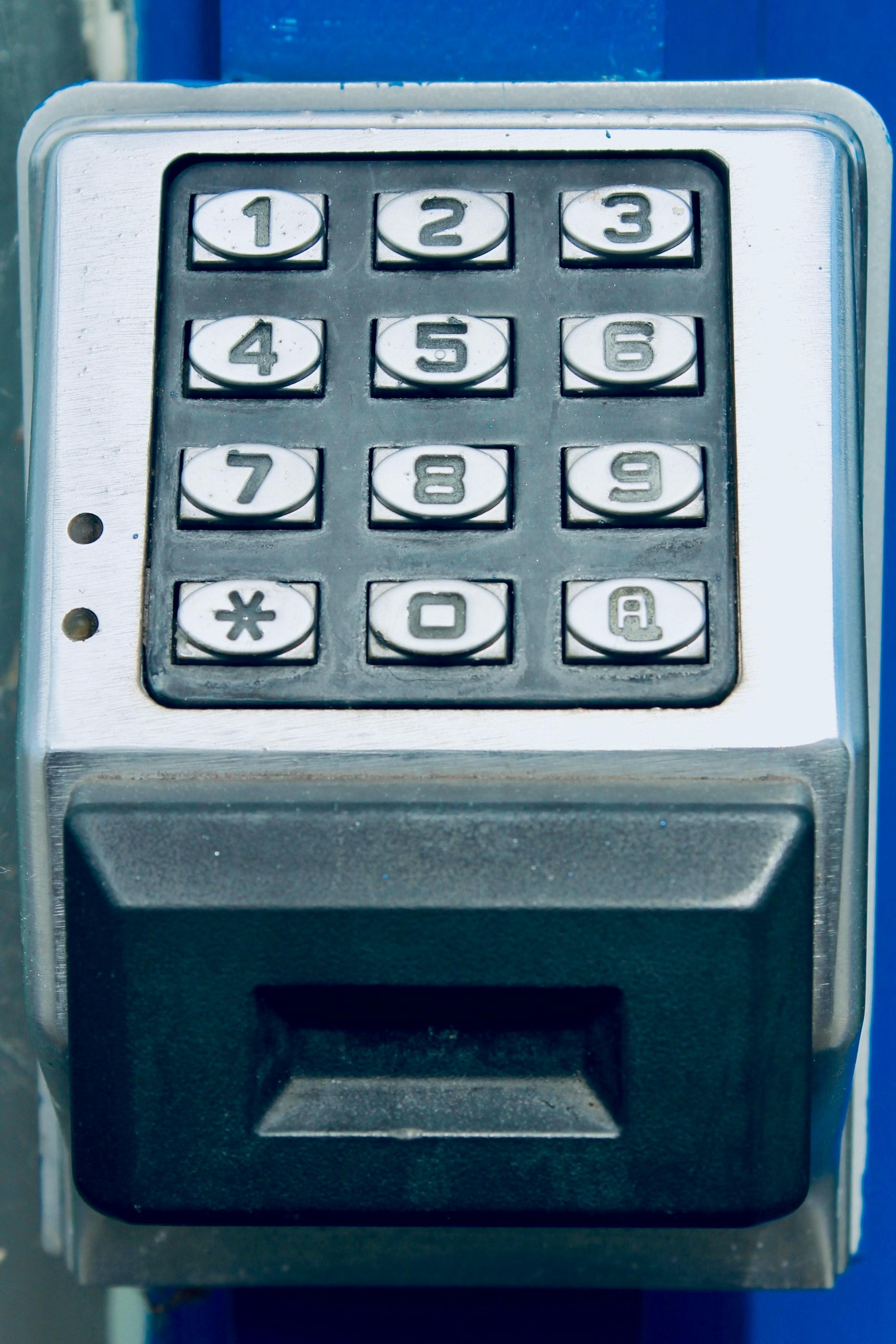 Commercial keypad access control device mounted on an industrial door