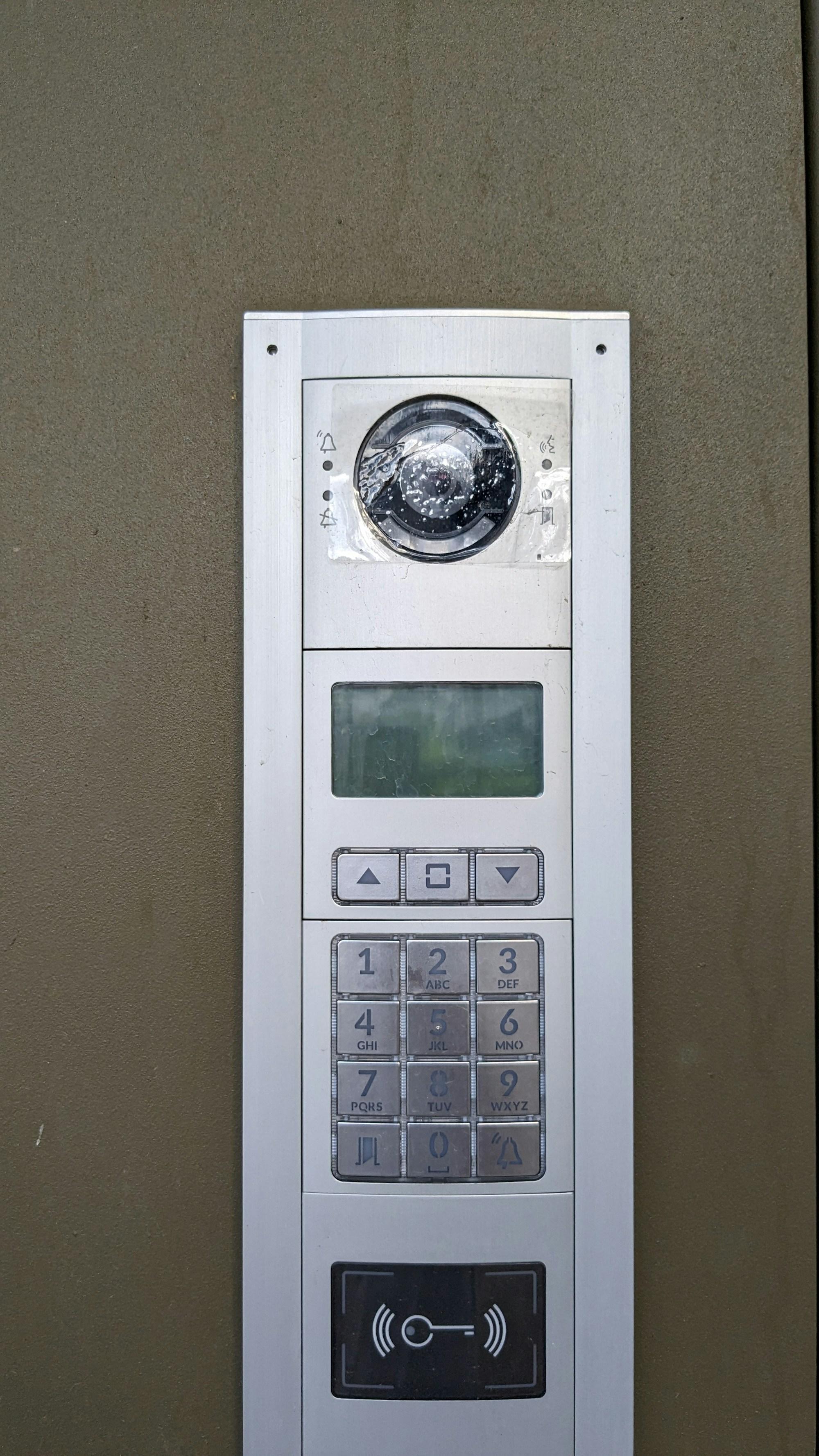 Modern access control panel with keypad, badge reader, and video intercom